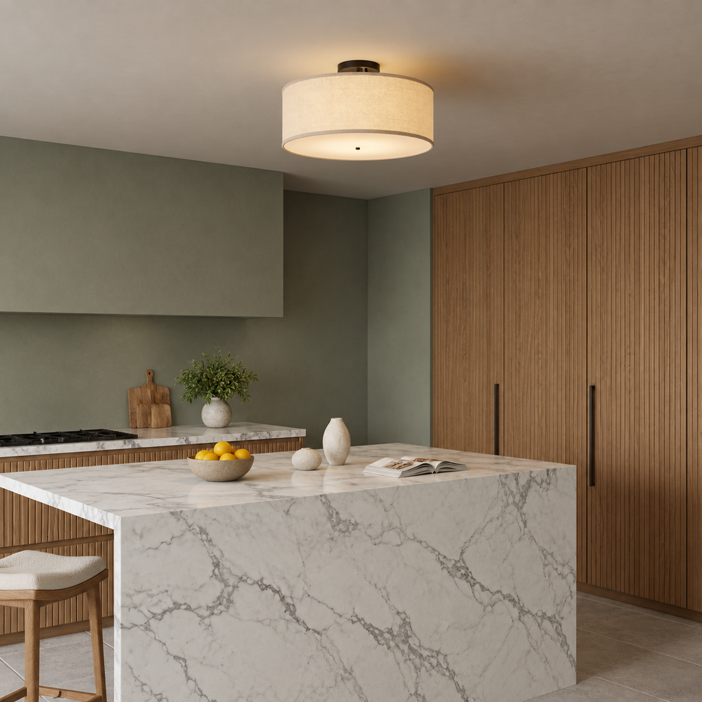 Naline flush ceiling light above a marble kitchen worktop on a sage green wall