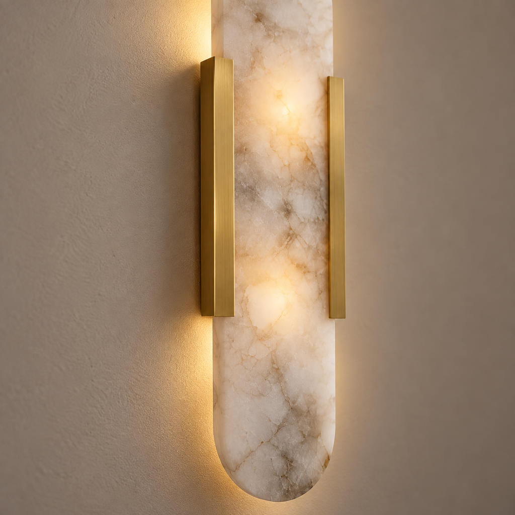 Close-up of the veined alabaster plate of the Selora wall light lit from within