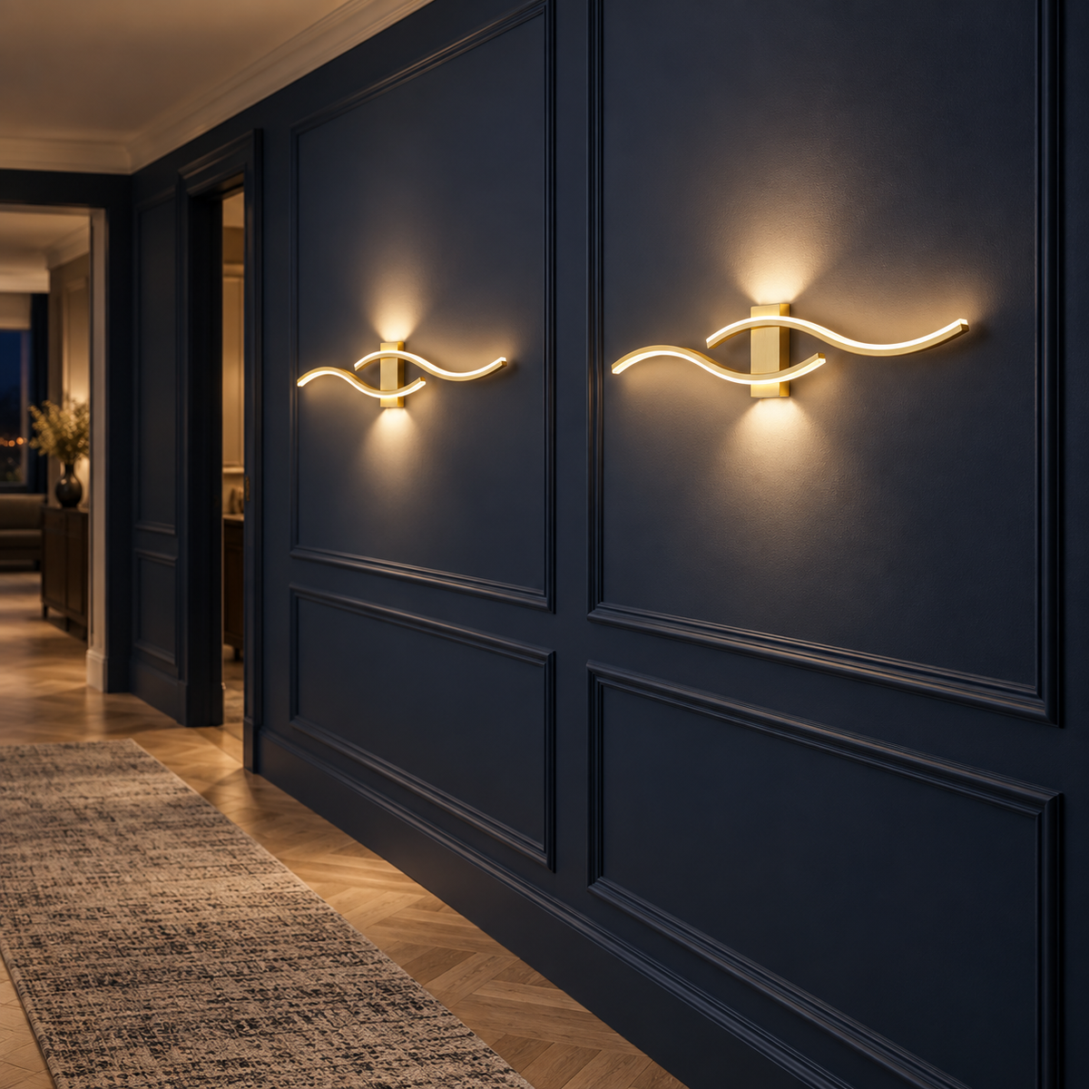 Two Venira wall lights along a navy panelled hallway