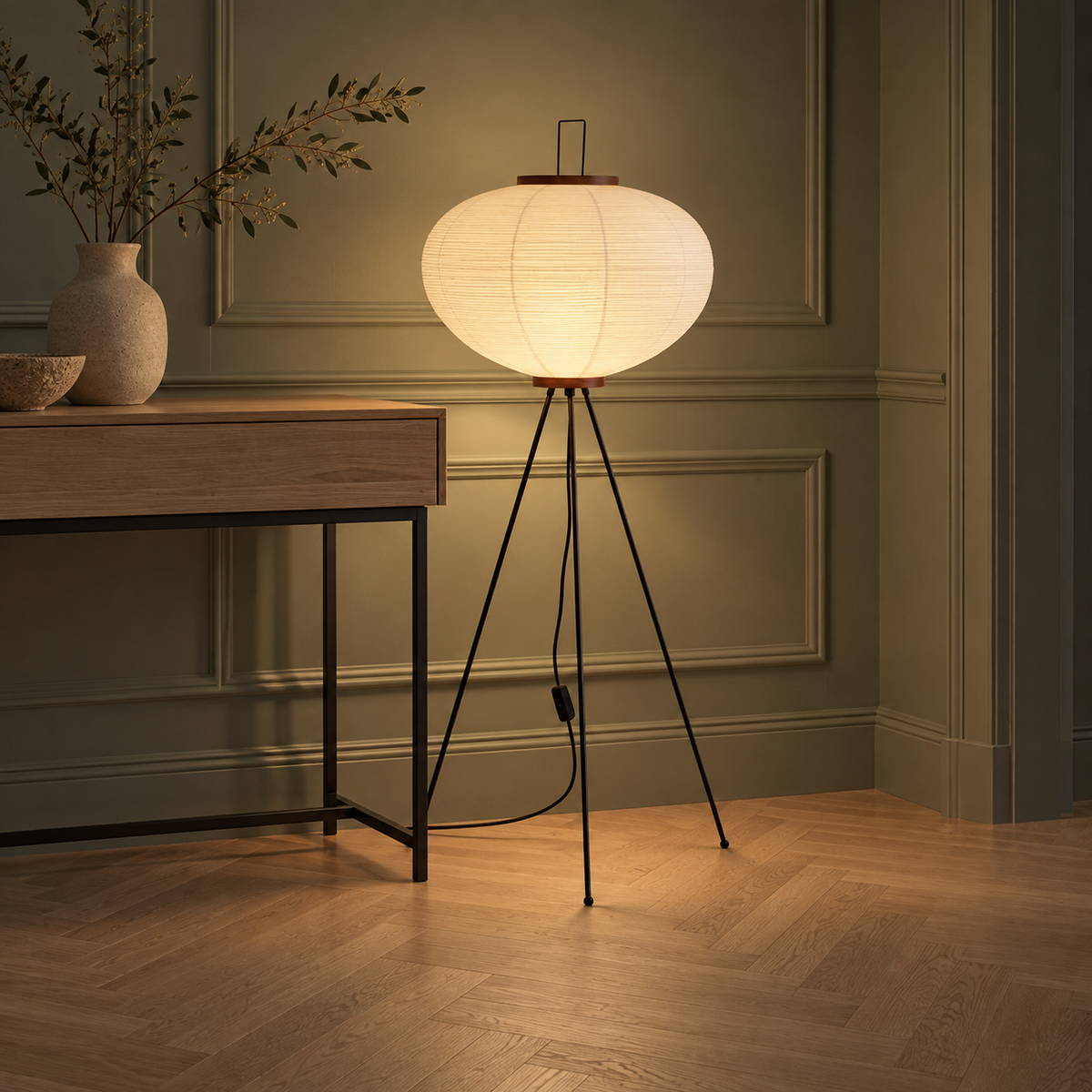 Verira floor lamp beside an oak console in a sage green hallway