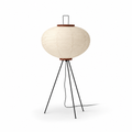 Verira rice paper floor lamp on a black tripod, on a white background